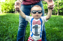 Load image into Gallery viewer, Baby Boy First Birthday Outfit – 5-Piece Cake Smash Set with “One” Onesie, Bow Tie, Leg Warmers, Bib & Party Hat – Dr. Seuss, Carnival or Patriotic Theme