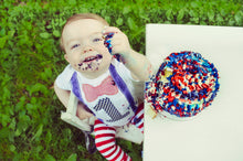Load image into Gallery viewer, Baby Boy First Birthday Outfit – 5-Piece Cake Smash Set with “One” Onesie, Bow Tie, Leg Warmers, Bib & Party Hat – Dr. Seuss, Carnival or Patriotic Theme